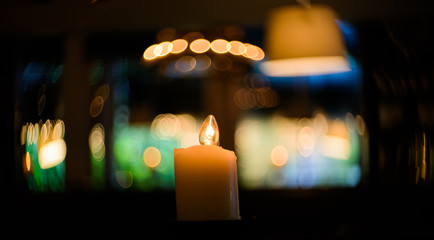 Candle in the dark, wedding candle with bokeh light background