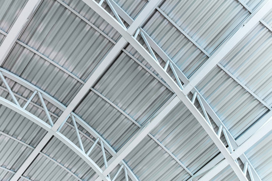 metal truss roofing of the industrial building. inside view