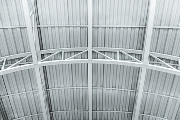 ceiling of the industrial building. metal structure of warehouse roof