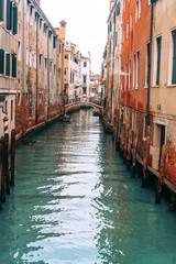 Fototapeta na wymiar Colourful and relaxing canal in Venice
