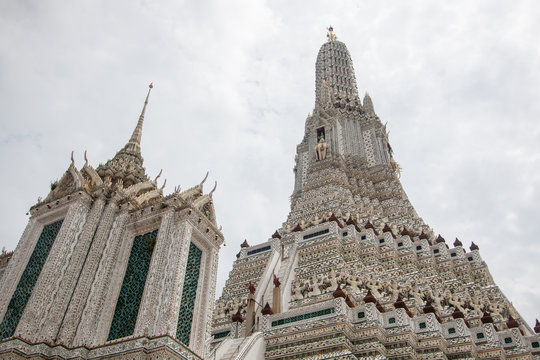 Wat Arun Ratchawararam Ratchawaramahawihan or Wat Arun buddhist temple of dawn . famous ancient grand palace in Bangkok Thailand , asian travel landmark . old historic architecture .