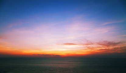 Fototapeta na wymiar Colorful dramatic sky and clouds over the sea.