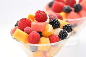 Dessert on the table. Sliced fruit.