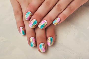 Pink and light blue abstract painting nail art
