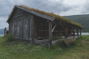 Fototapeta na wymiar Old rustic buildings in coastal Norway in fishing village