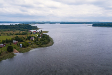 Obraz premium Bird's eye view of the lake and the village. Pidma, Karelia, Russia.