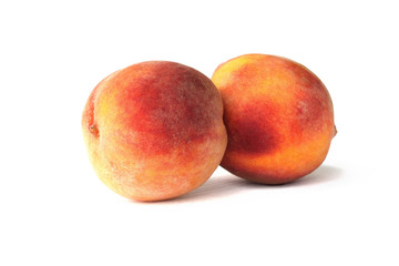 Pair of fresh peaches on white background for design
