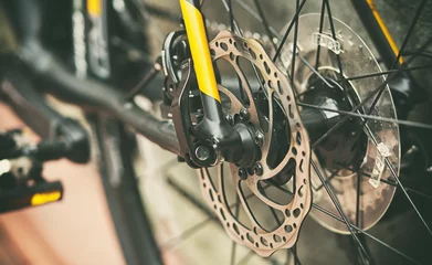 Photo sur Plexiglas Vélo Brake disk in good condition on the black bicycle