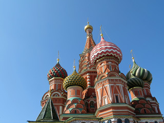 Fototapeta na wymiar St. Basil's Cathedral against isolated on clear blue sky. Russian tourist landmark on Red Square in Moscow