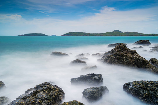 Long exposure shot of rocks on the sea