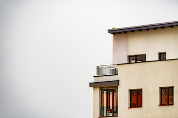Section of a penthouse from an apartment building with room for text