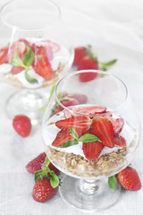 Yogurt with granola and strawberry