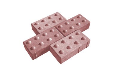 3D realistic render of three red lock paving bricks. Isolated on white 
