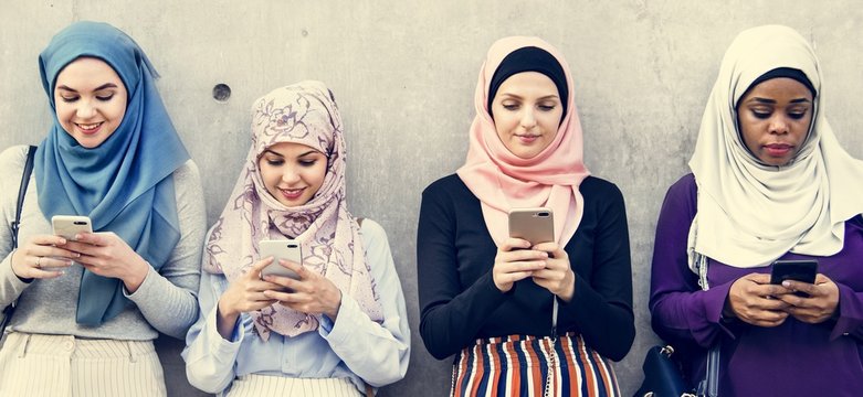 Group of islamic girls using smart phone