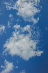 Bright blue sky with white clouds, sky after the storm with storm clouds