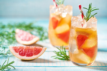 Alcoholic cocktail or grapefruit margarita with ice.