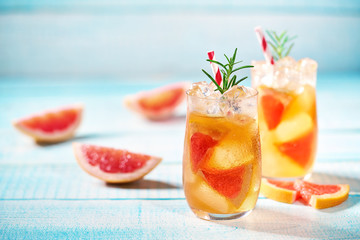 Ripened grapefruit and fresh rosemary to prepare a refreshing summer margarita