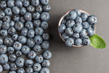 blueberry with mint on a stone background slate