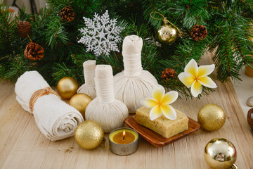 Christmas spa with Composition of spa treatment and wooden background