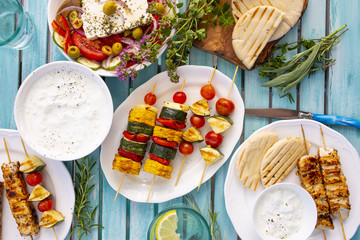 Delicious grilled chicken souvlaki and vegetables skewers.  © iMarzi