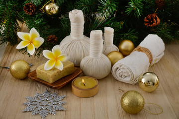 Christmas spa with Composition of spa treatment and wooden background
