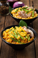 tom yam soup pasta on wood

