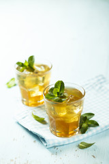 Homemade iced tea with lemon and mint