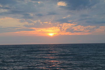 Obraz premium Coucher de soleil à la mer