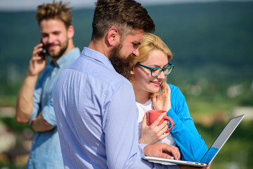 Coffee break concept. Business partners meeting non formal atmosphere. Colleagues with laptop work...