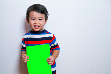 Smiling Face Of Asian Young Boy on white background. Stock Photo