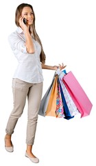 Portrait of a Woman Walking with Shopping Bags while Talking on