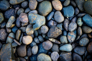 Black pebbles stone background