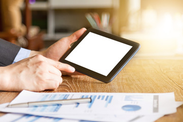 business man using tablet computer on office desk