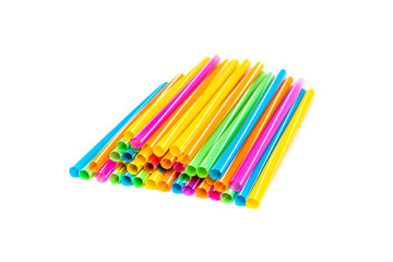stack of colorful drinking straws on white background