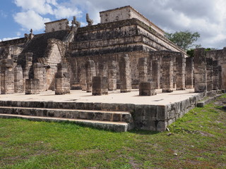 Fototapeta premium Ancient ruins of platform of Temple of Warriors building at Chichen Itza city in Mexico on February