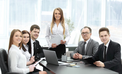 business woman with her business team at the meeting