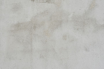 Wall fragment with scratches and cracks