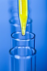 Closeup of Test Tubes and Pipette