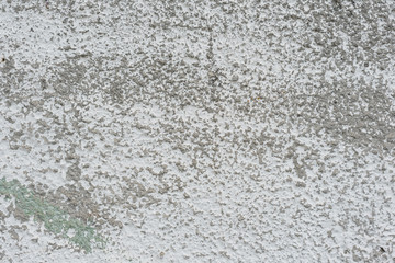 Wall fragment with scratches and cracks