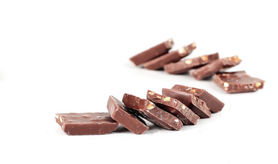 slices of original milk chocolate .isolated on white