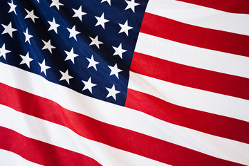 American flag laying as background, xlose up.