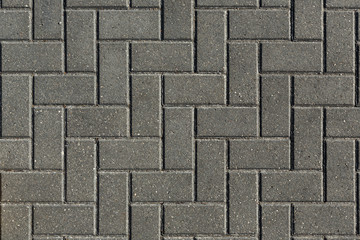 surface paved with road tiles. top view.