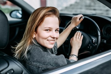 beautiful young girl driver smiling. 