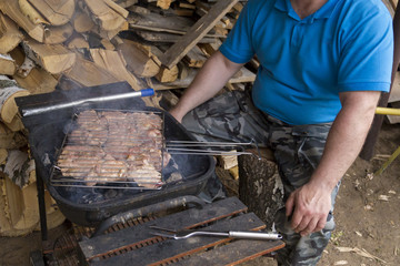 A man is frying meat