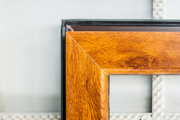 Detail of a PVC window profile margin, color wood in factory