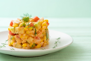 mixed fruit salad with crab stick (apple, corn, papaya, pineapple)