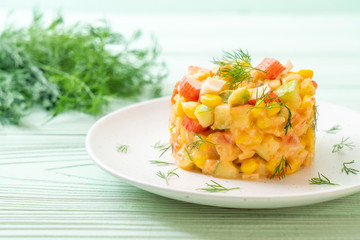 mixed fruit salad with crab stick (apple, corn, papaya, pineapple)