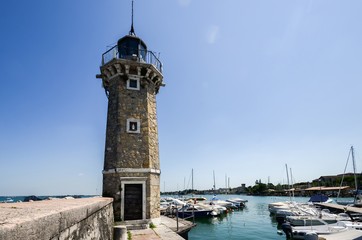 Lighthouse at Desenzano on Lake Garda on a sunny day, Brescia, Lombardy, Italy