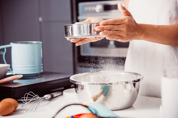 Woman girl in kitchen cooking baker bakery powder dough