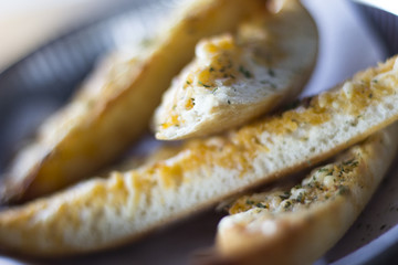 Eating bread at a resturant in the summer sun  